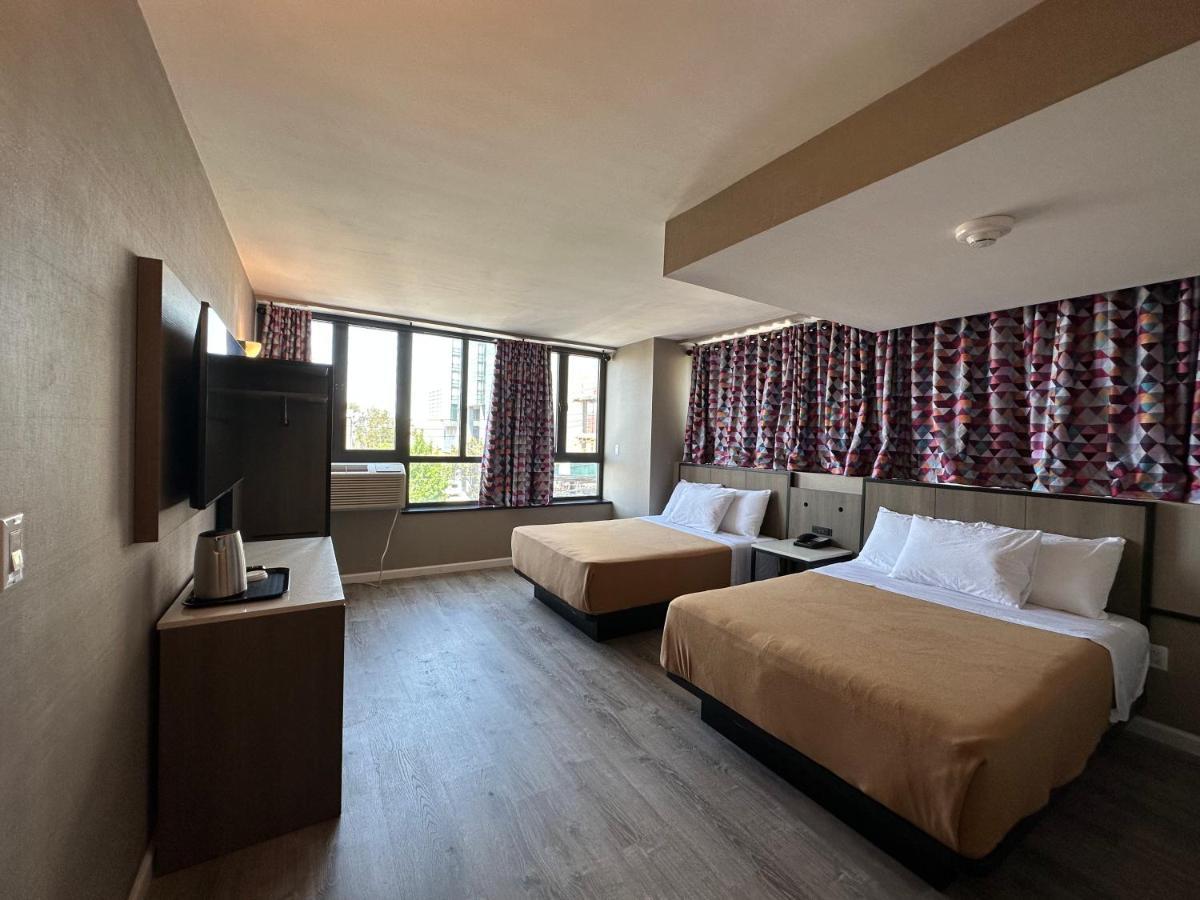 Regal Inn & Suites New York Laguardia Hotel Экстерьер фото